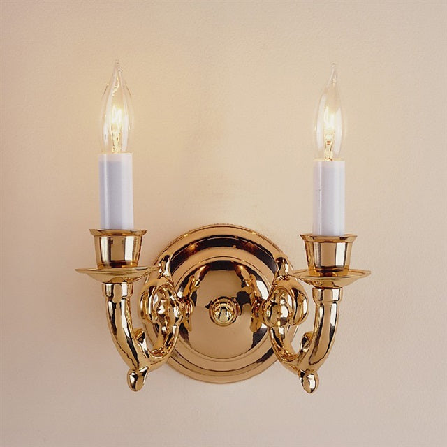 Two light oval brass sconce